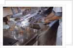 Washing Glasses at Diner by Anonymous