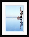 Woman Exercising on Swimming Pool Edge by Anonymous