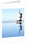 Woman Exercising on Swimming Pool Edge by Anonymous