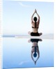 Woman Exercising on Swimming Pool Edge by Anonymous