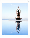 Woman Exercising on Swimming Pool Edge by Anonymous