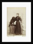 Albumen Print Card Showing Woman with a Black Miniature Poodle by Anonymous