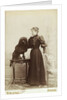 Albumen Print Card Showing Woman with a Black Miniature Poodle by Anonymous