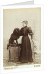 Albumen Print Card Showing Woman with a Black Miniature Poodle by Anonymous