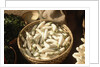 Basket of White Eggplants at the Market by Anonymous