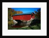 Red Covered Bridge on Rural Road by Anonymous