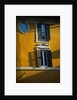 Shuttered Windows on Yellow Building by Anonymous