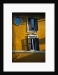 Shuttered Windows on Yellow Building by Anonymous