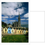 St. Coleman's Cathedral of Cobh Behind Colorful Row Houses by Anonymous