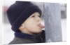 Boy Putting Tongue to Frozen Pole by Anonymous