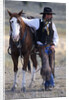 Cowboy Waiting with Horse by Anonymous