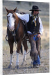 Cowboy Waiting with Horse by Anonymous