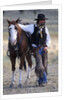 Cowboy Waiting with Horse by Anonymous