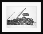 Crane Stacking Up Old Cars to be Burned in a Bonfire by Anonymous