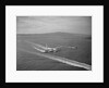 Howard Hughes' Spruce Goose Taxiing Across Water by Anonymous