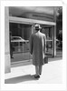 Salesman in Front of Office Building by Anonymous