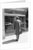 Salesman in Front of Office Building by Anonymous