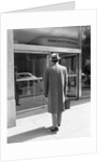 Salesman in Front of Office Building by Anonymous