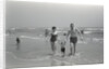 Family Walking on the Beach by Anonymous
