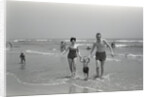 Family Walking on the Beach by Anonymous