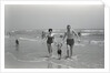 Family Walking on the Beach by Anonymous
