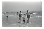 Family Walking on the Beach by Anonymous