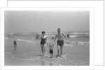Family Walking on the Beach by Anonymous