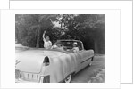 Family In Car by Anonymous