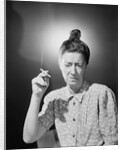 Woman with Top Knot Smoking by Anonymous