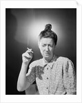 Woman with Top Knot Smoking by Anonymous