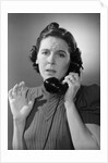 Anxious Woman On The Telephone by Anonymous