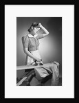 Woman Hard at Work Ironing by Anonymous