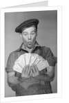 Man Holding Fan of Money by Anonymous