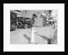 Dog Seated on Fire Hydrant by Anonymous