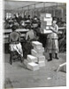 Girl Carrying Boxes; Cigarette Factory by Anonymous