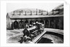 Round House With Train In Center by Anonymous