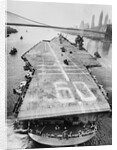 Huge Supercarrier Sailing Under Bridge by Anonymous