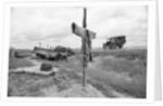 Ambulance Driving By Grave With Cross by Anonymous