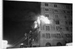 Firemen On Ladder At Flame-Engulfed Wind by Anonymous
