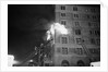 Firemen On Ladder At Flame-Engulfed Wind by Anonymous