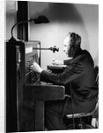 Man Connecting Call At Switchboard by Anonymous