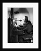 Man Connecting Call At Switchboard by Anonymous