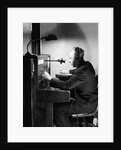 Man Connecting Call At Switchboard by Anonymous