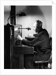 Man Connecting Call At Switchboard by Anonymous