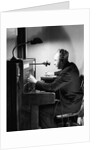Man Connecting Call At Switchboard by Anonymous