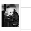 Man Connecting Call At Switchboard by Anonymous