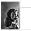 Girl Sipping a Soda by Anonymous