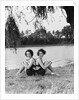 Twin Sisters Sitting Back to Back by Anonymous