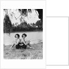 Twin Sisters Sitting Back to Back by Anonymous