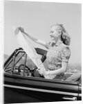 Young Woman Reading Road Map by Anonymous